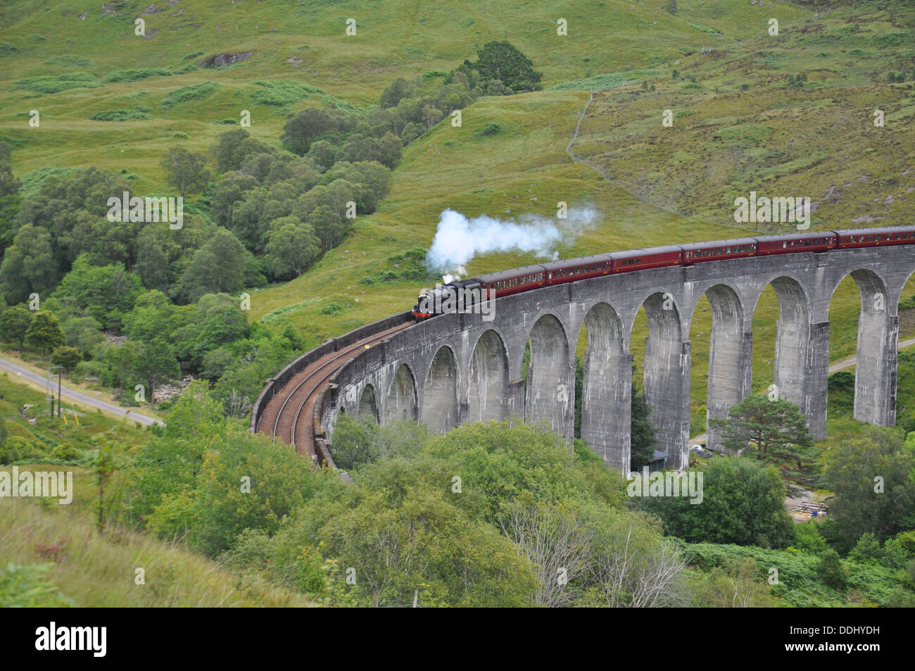 Jacobite Steam train on the Glenfinnan Viaduct near Loch Shiel in Western Scotland Stock Photo