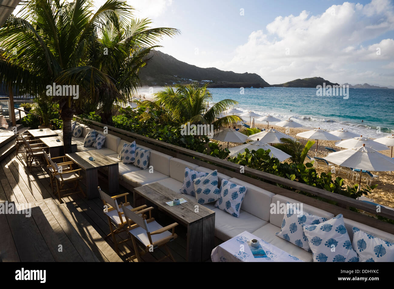 Cocktail lounge / restaurant with beach views and palm trees Stock Photo
