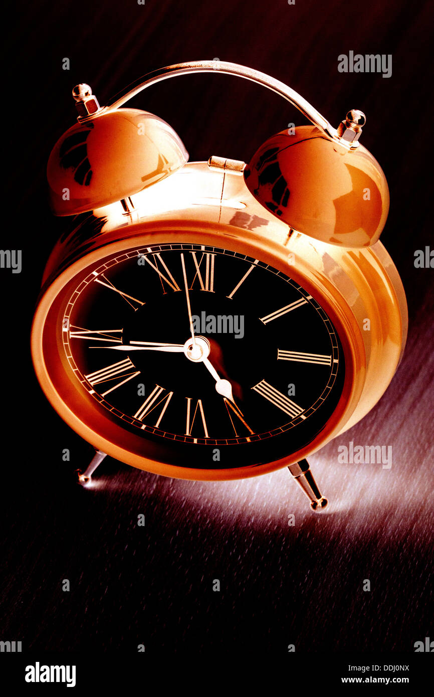 Negative Image of Alarm Clock, black background Stock Photo