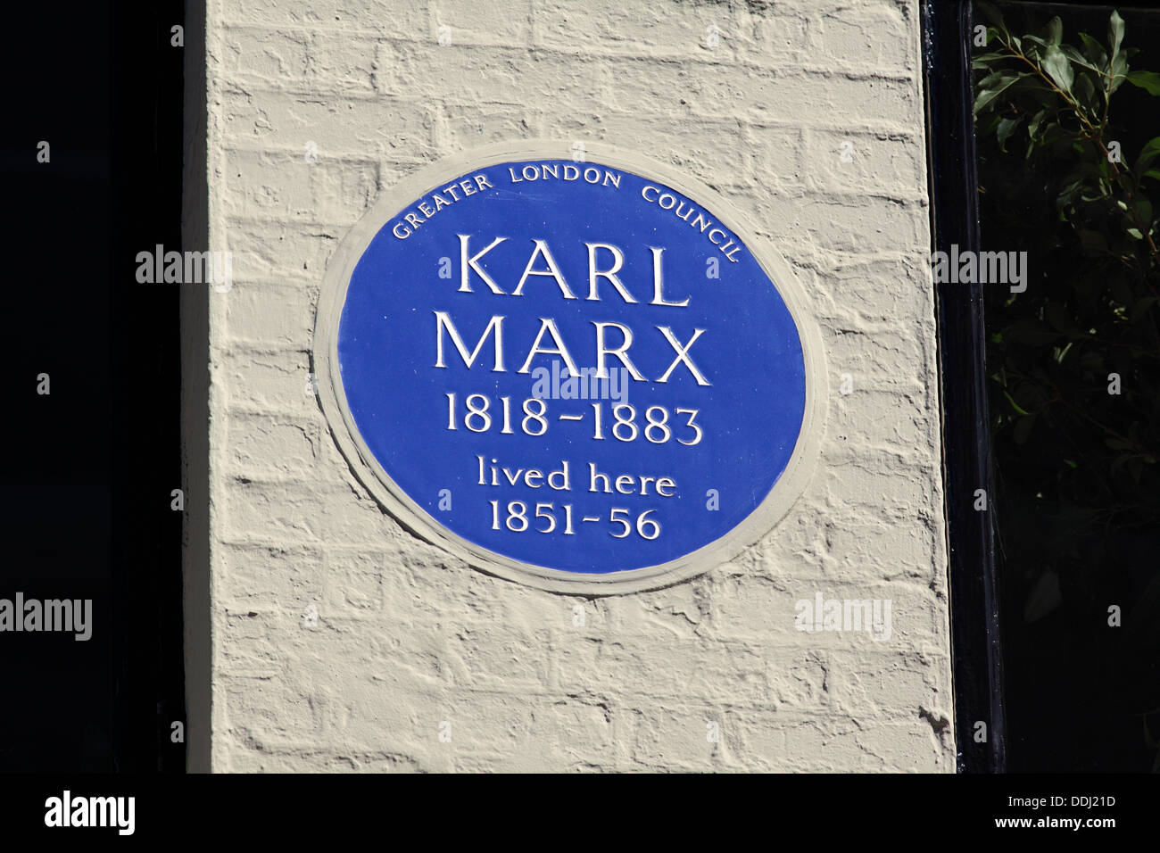 Blue plaque commemorating Karl Marx in Dean Street, London, He lived at this address in Soho in the 1850s. Stock Photo