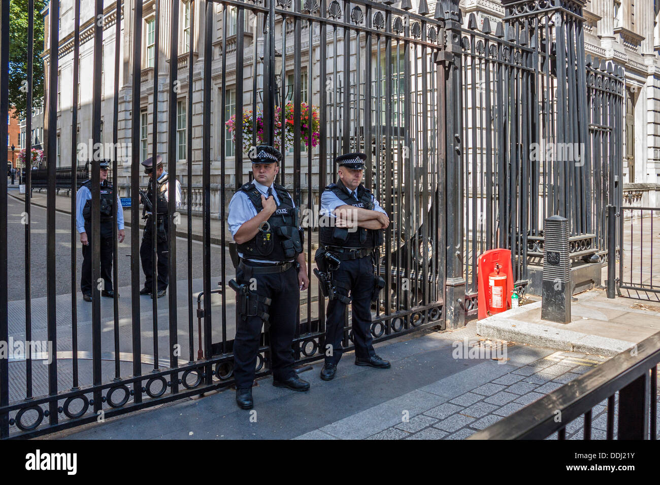Downing Street Gates and armed police presence Stock Photo