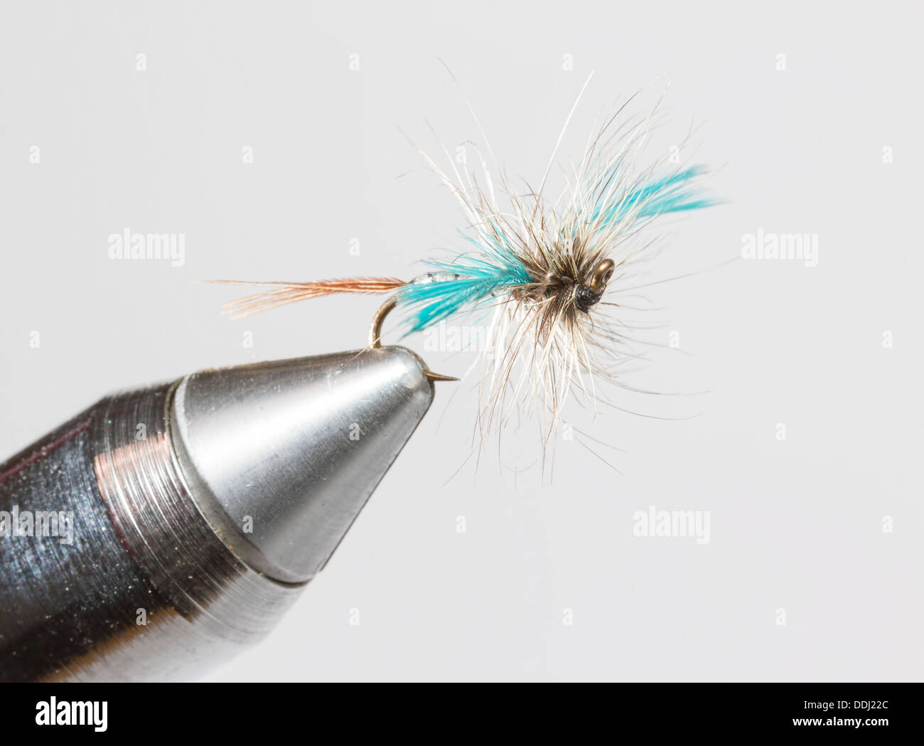 Hand tied fishing fly in clamp Stock Photo Alamy