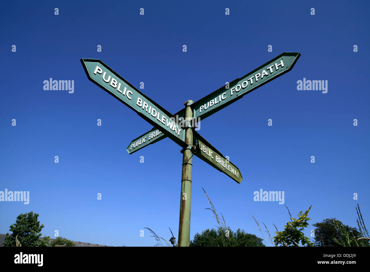 A sign post at a junction of bridleways and footpaths, in countryside near Ditchling, East Sussex. Stock Photo