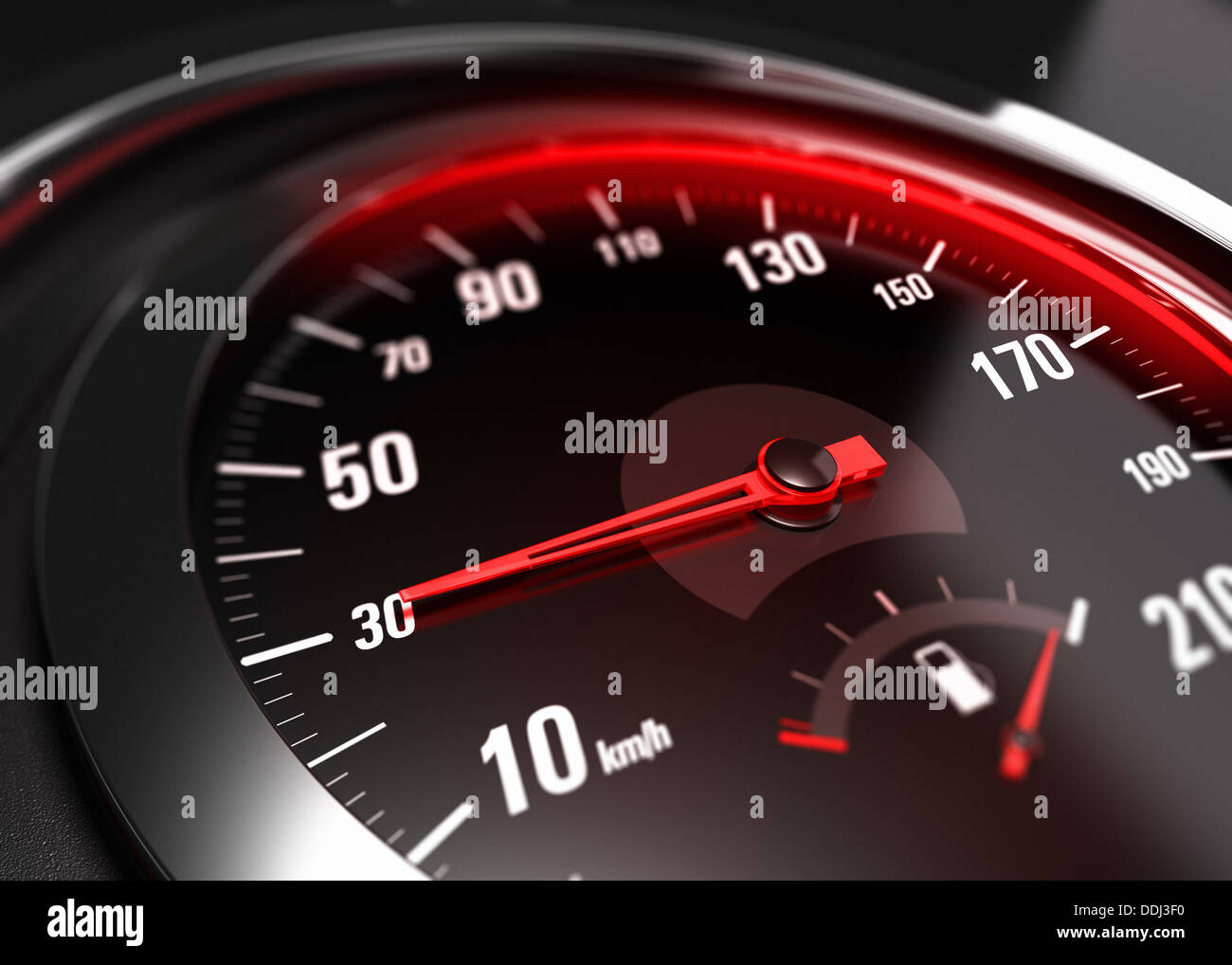 Close up of a car speedometer with the needle pointing 30 Km h, blur