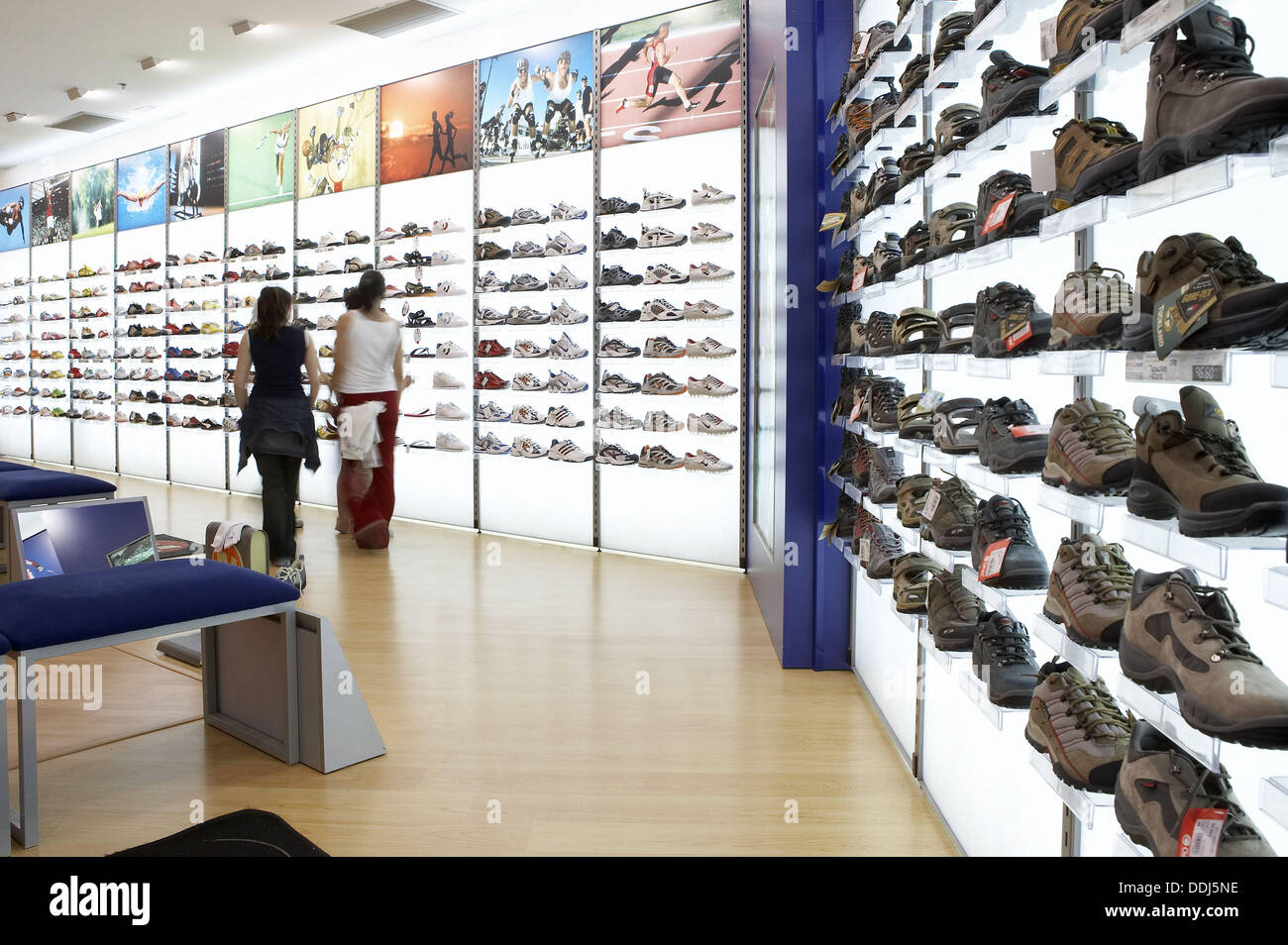 Sports shoes in shoe shop, shopping 