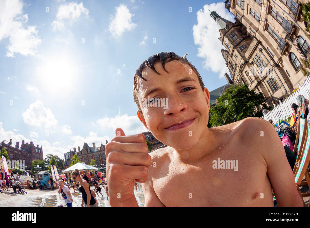 Teenager enjoying water fun Stock Photo