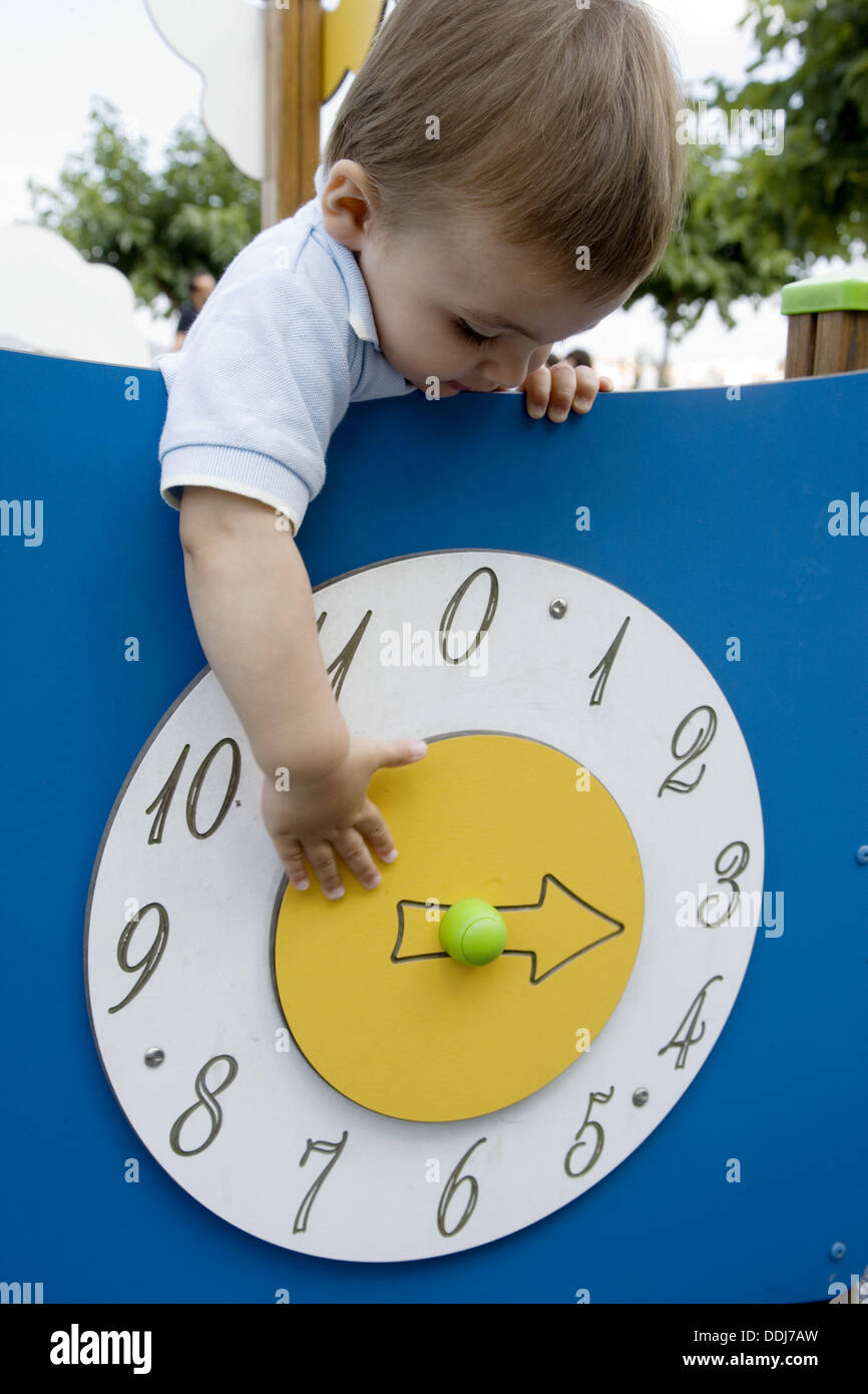 1 year old boy in playground Stock Photo Alamy