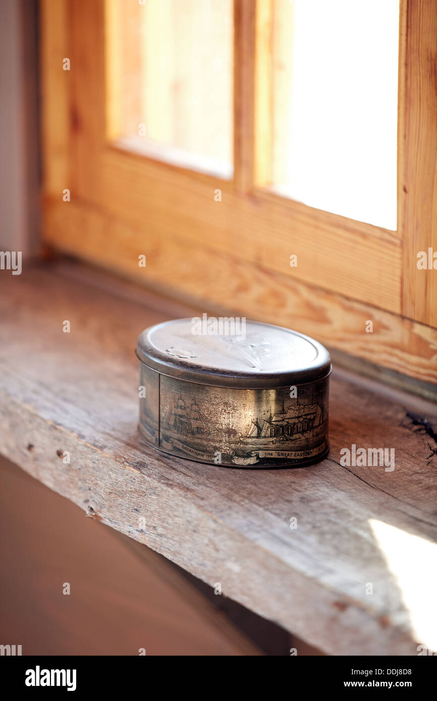 Metal trinket box sitting on a window ledge Stock Photo - Alamy