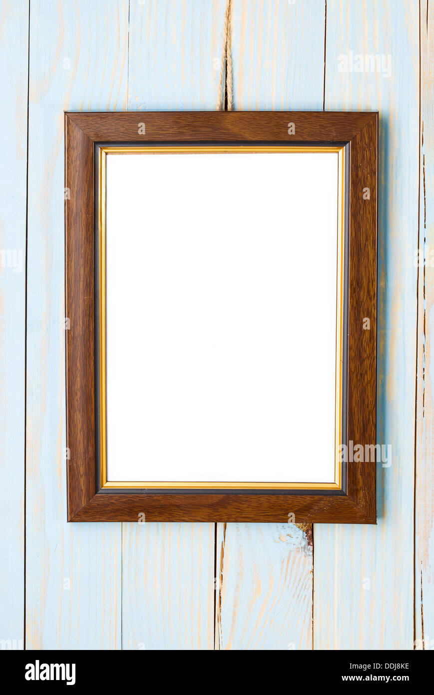 Wooden picture frame on a wooden blue background Stock Photo