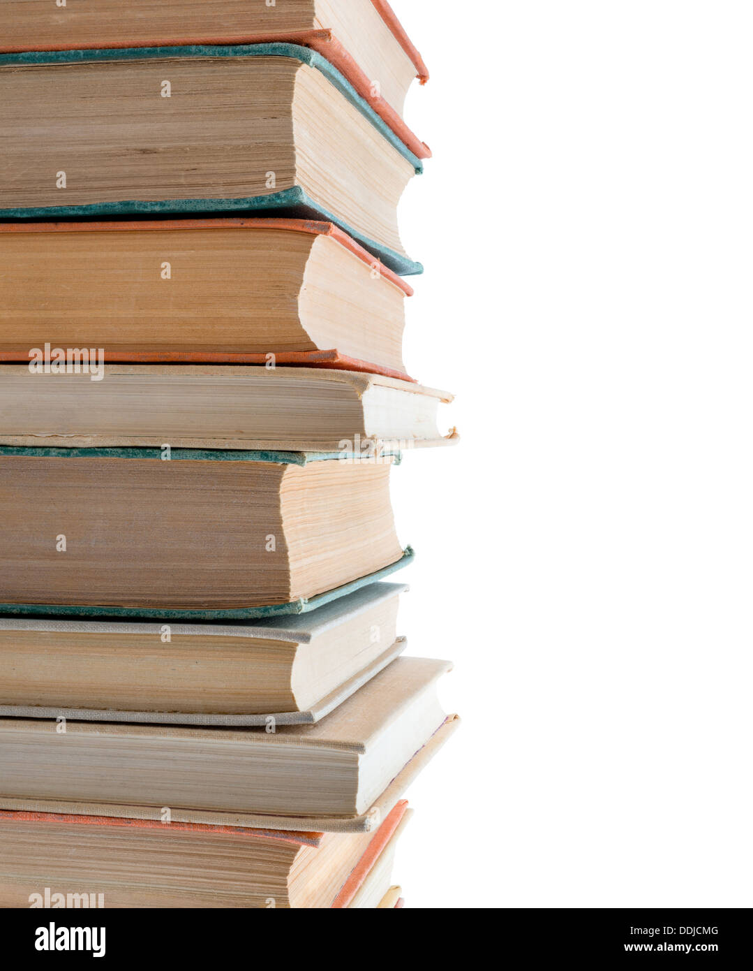Isolated objects: old books stack on white background, close-up shot. Can be used in landscape mode too. Stock Photo