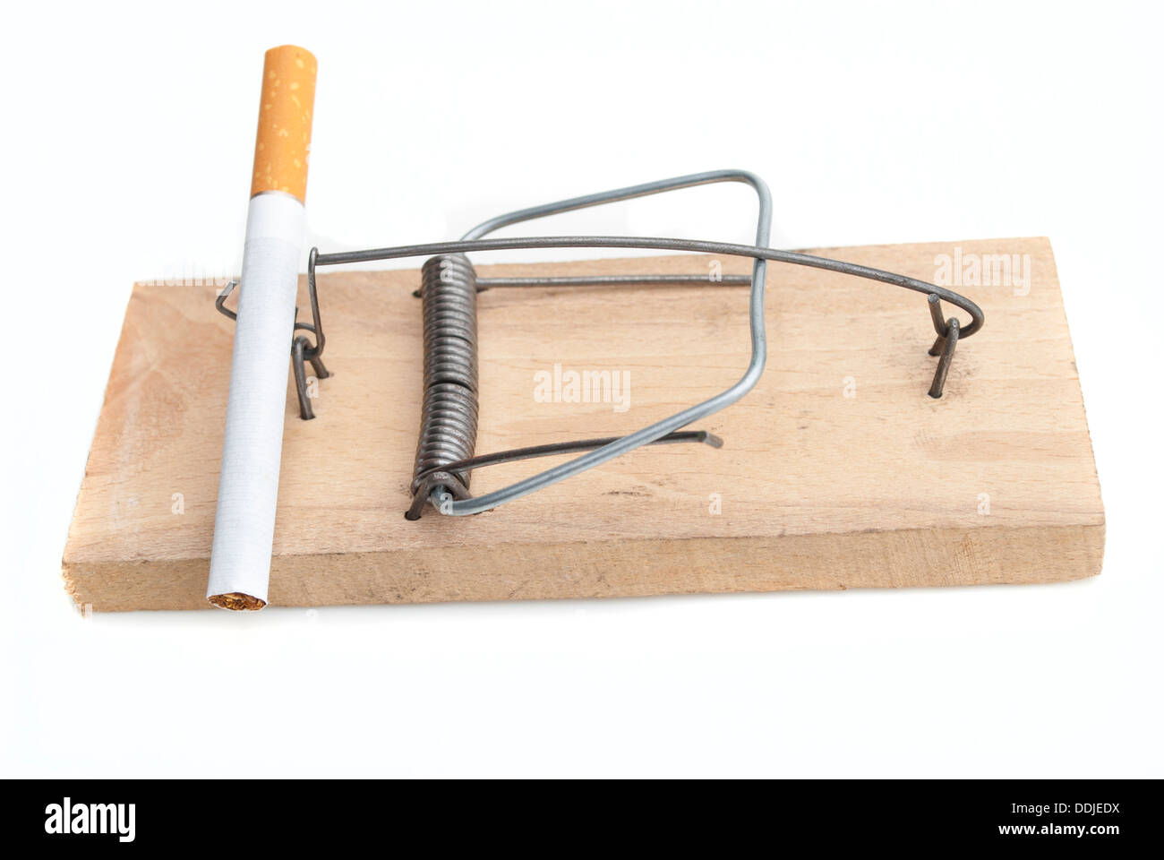 Cigarette in mousetrap Stock Photo