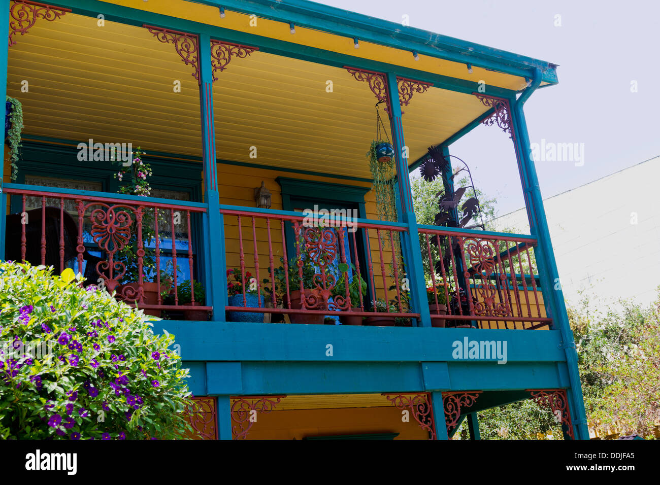 Colorfully painted and decorated balcony on building in Cambria, California Stock Photo