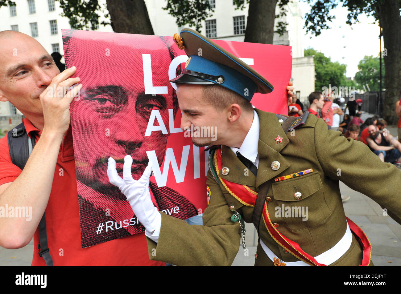 Whitehall, London, UK. 3rd September 2013. A protester has fun at Putins expence at, A Day of Action, 'Love Russia, Hate Homophobia' protest opposite Downing Street against the anti-gay laws in Russia. Credit:  Matthew Chattle/Alamy Live News Stock Photo