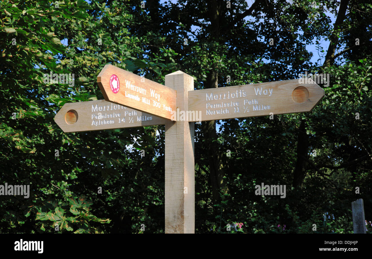 A direction signpost on the Marriotts Way long distance footpath at Lenwade, Norfolk, England