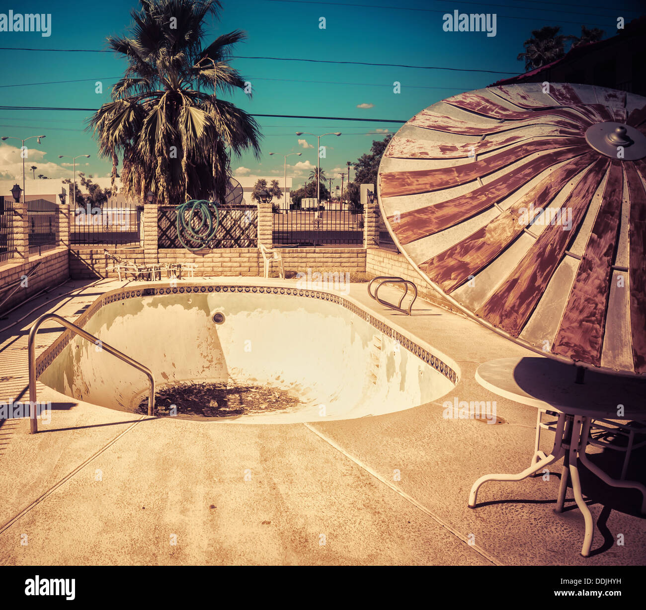 Abandoned American Motel swimming pool depicting South West urban decay Stock Photo