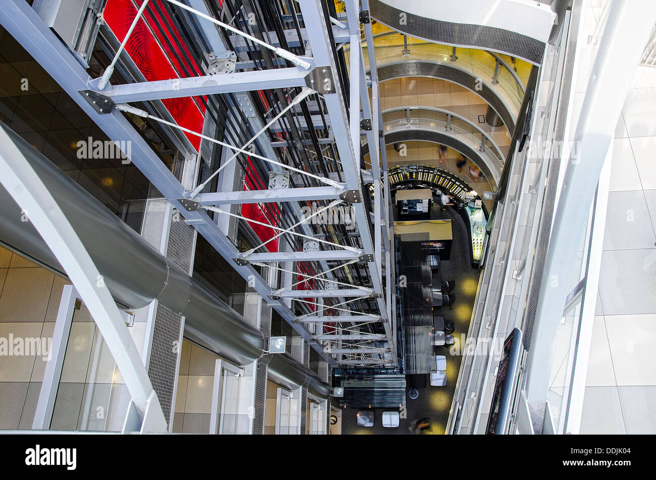 Glass elevator shafts, escalators and stairs in a modern office