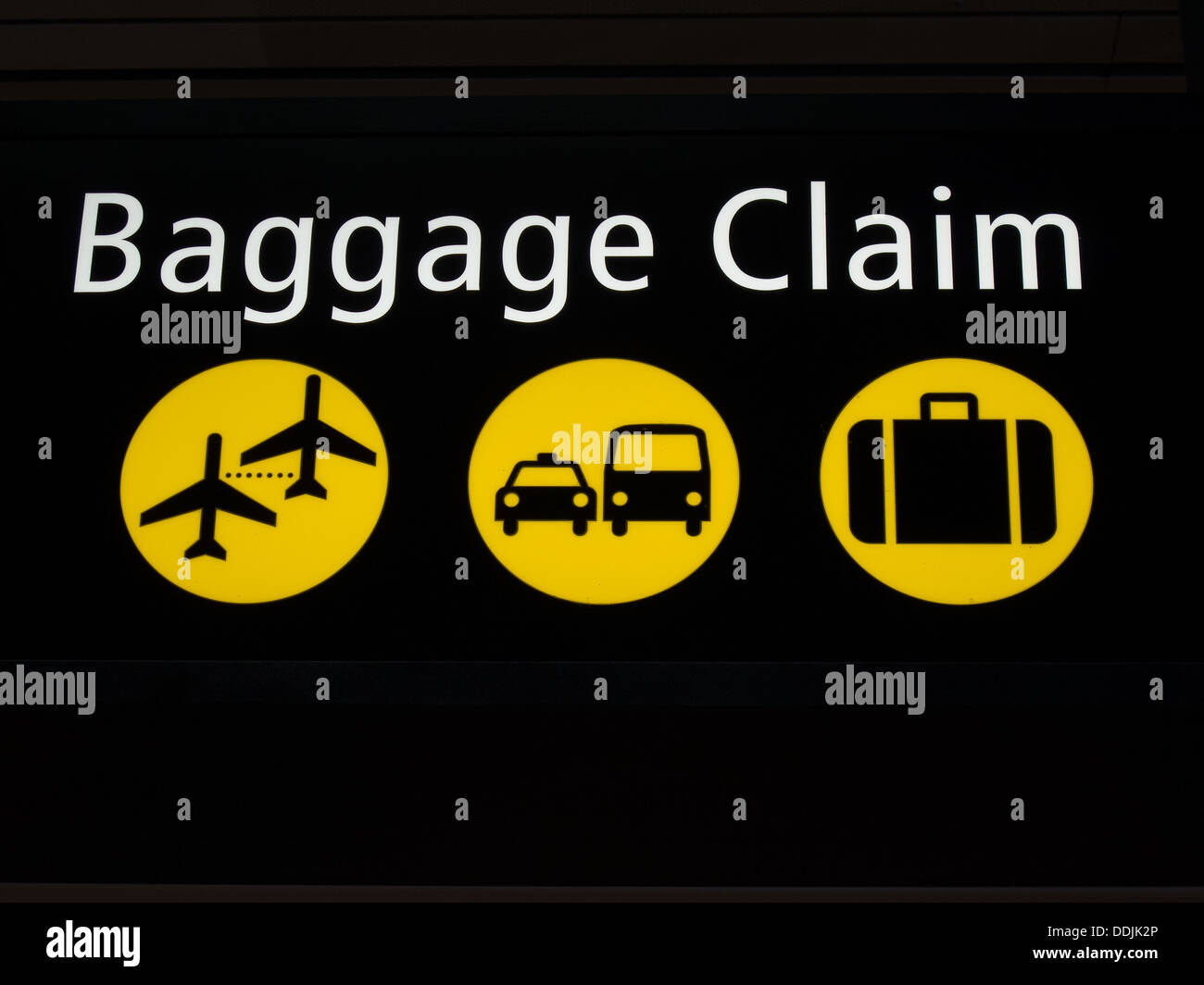Airport baggage sign directing passengers to various areas of the airport Stock Photo