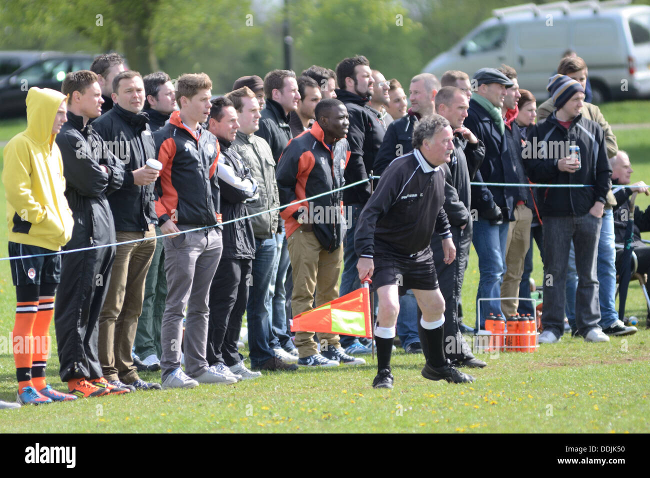 Crowd and linesman at a Downs League Football Match, Bristol England Stock Photo