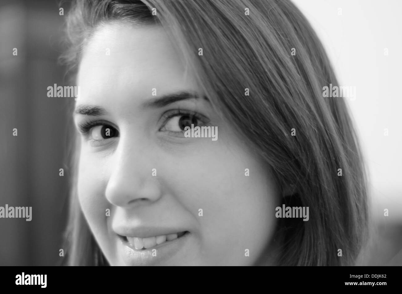 Young attractive woman with brown hair and brown eyes, black and white Stock Photo