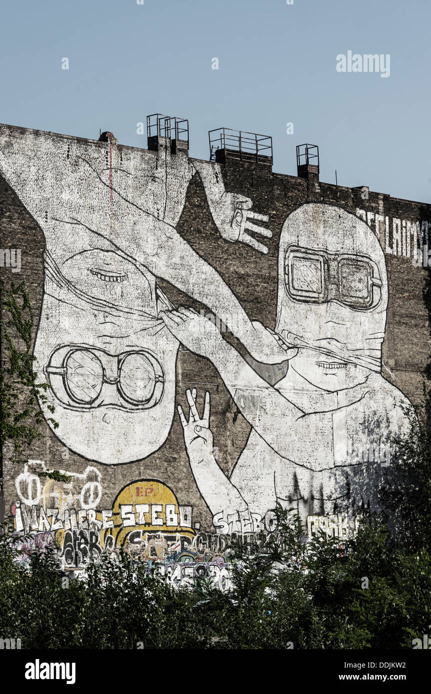 Mural on firewall in Kreuzberg by italian artist Blu , Berlin, Germany Stock Photo