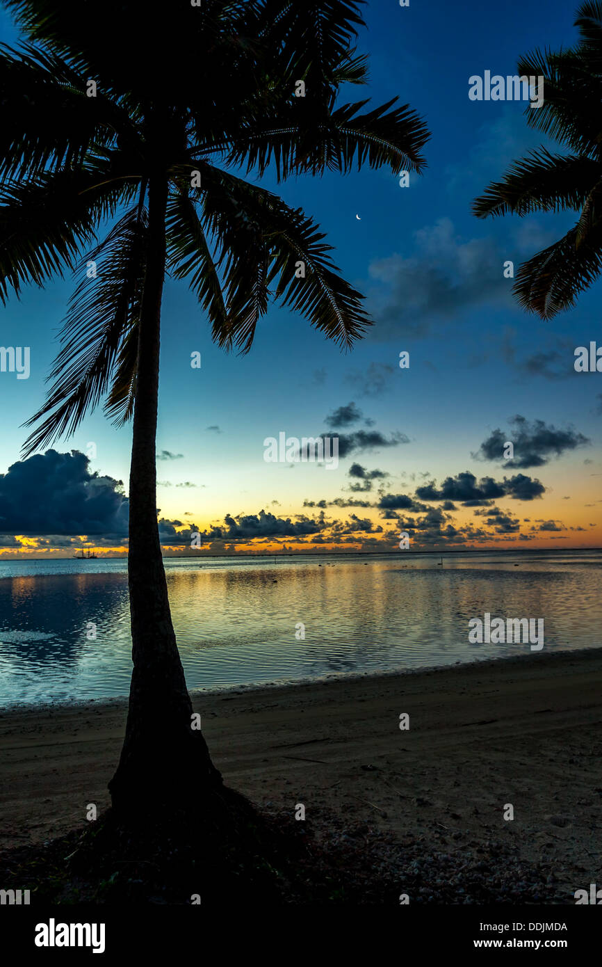 Cook Islands, Aitutaki island, tropical sunset colors in Amuri Beach ...