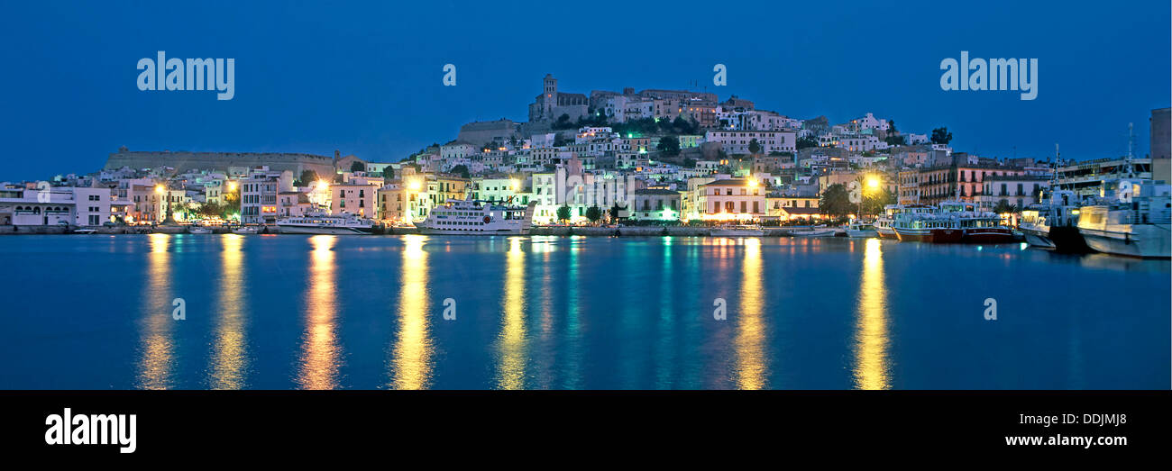 Spain, Baleares island, Ibiza, skyline, port ,Dalt Vila, twilight, panorama Stock Photo