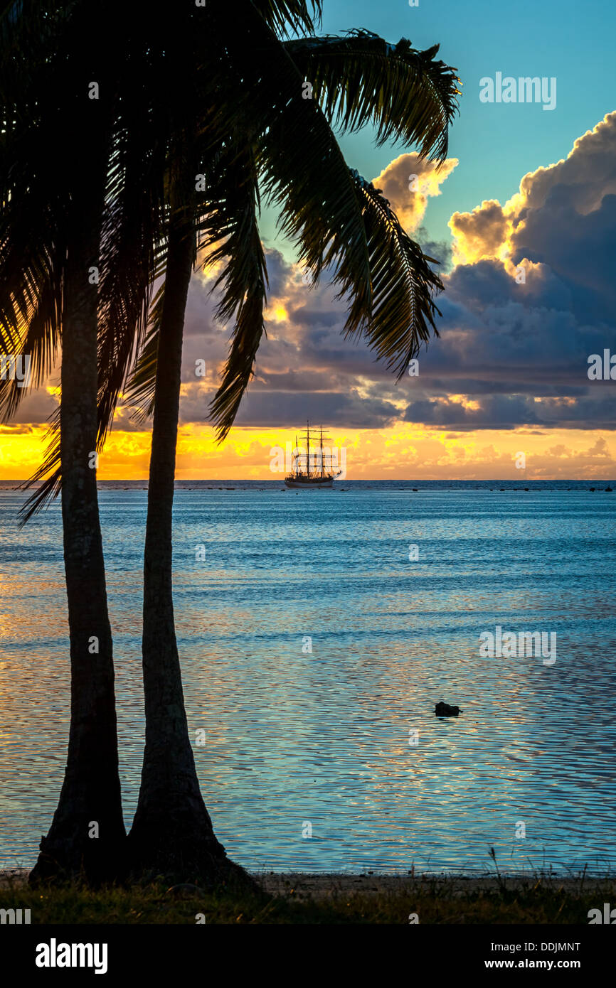 COOK ISLANDS, Aitutaki Island, tropical sunset colors in Amuri beach