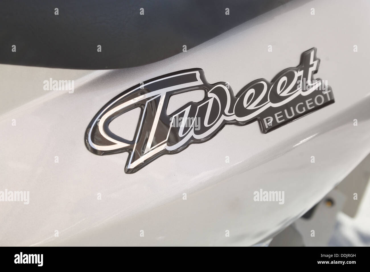 close up of peugeot tweet logo on scooter Stock Photo