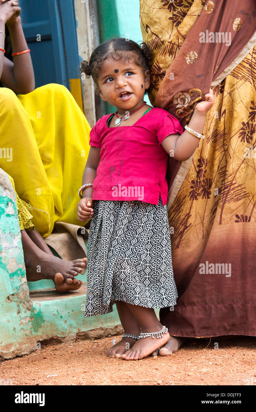 Indian infant girl and mother in a rural indian village. Andhra Pradesh, India Stock Photo