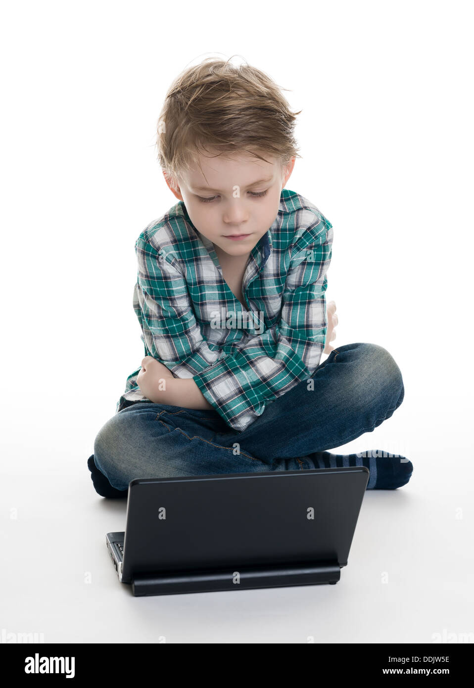 boy with a laptop on a white background Stock Photo - Alamy