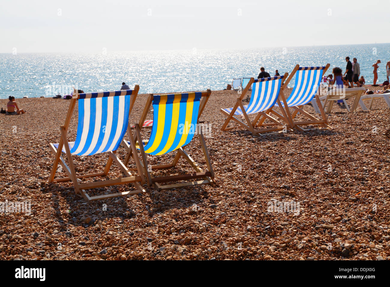 Deckchairs on Brighton beach, East Sussex, England, UK Stock Photo