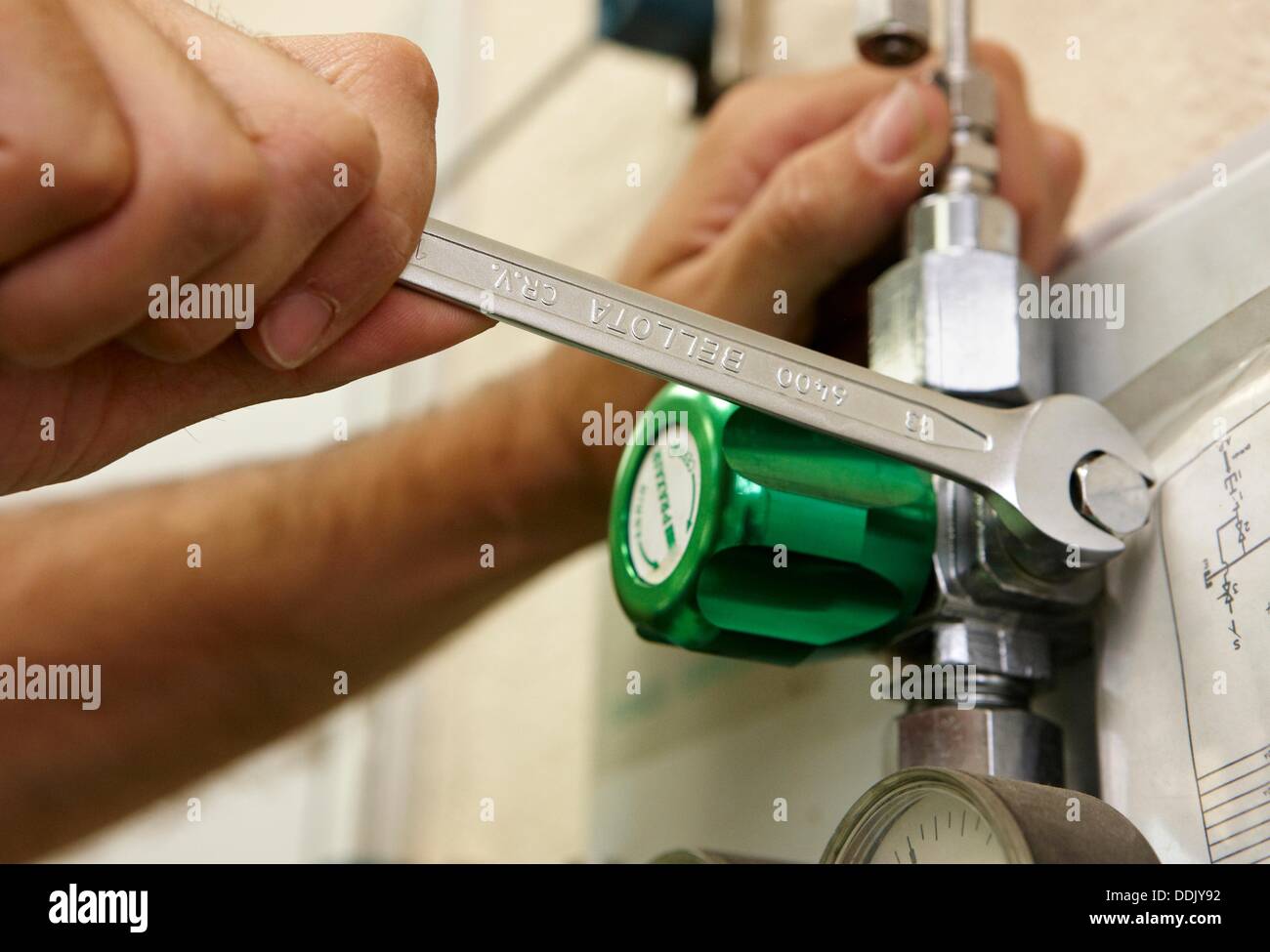 Gas maintenance, pressure valves, wrench Stock Photo Alamy