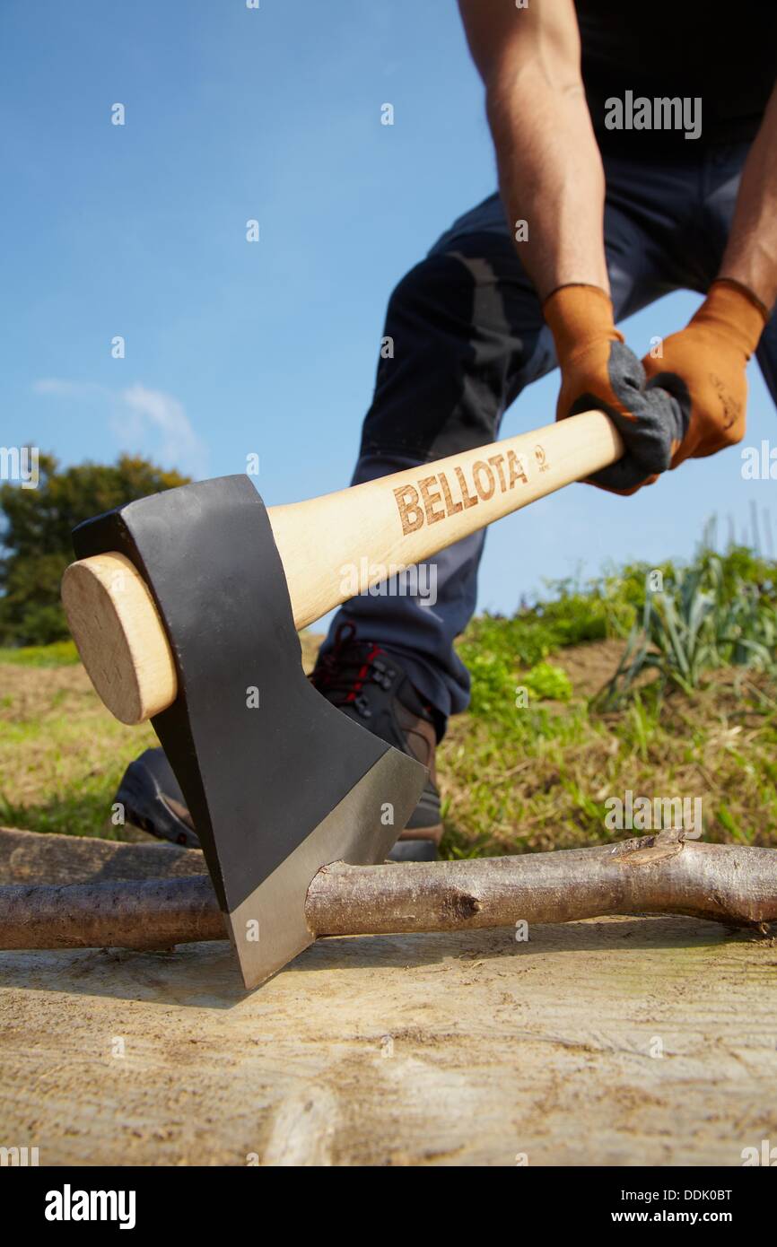 Farmer chopping wood with an ax, Axe, Agricultural and gardening hand