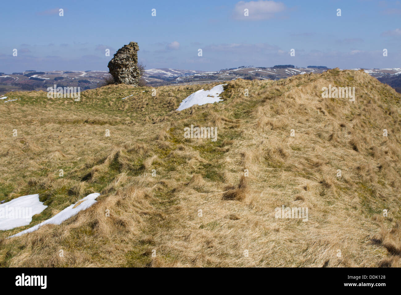 Remains of castle gatehouse on earthwork. Castell Tinboeth, near Llanbadarn Fynydd, Powys, Wales. April. Stock Photo