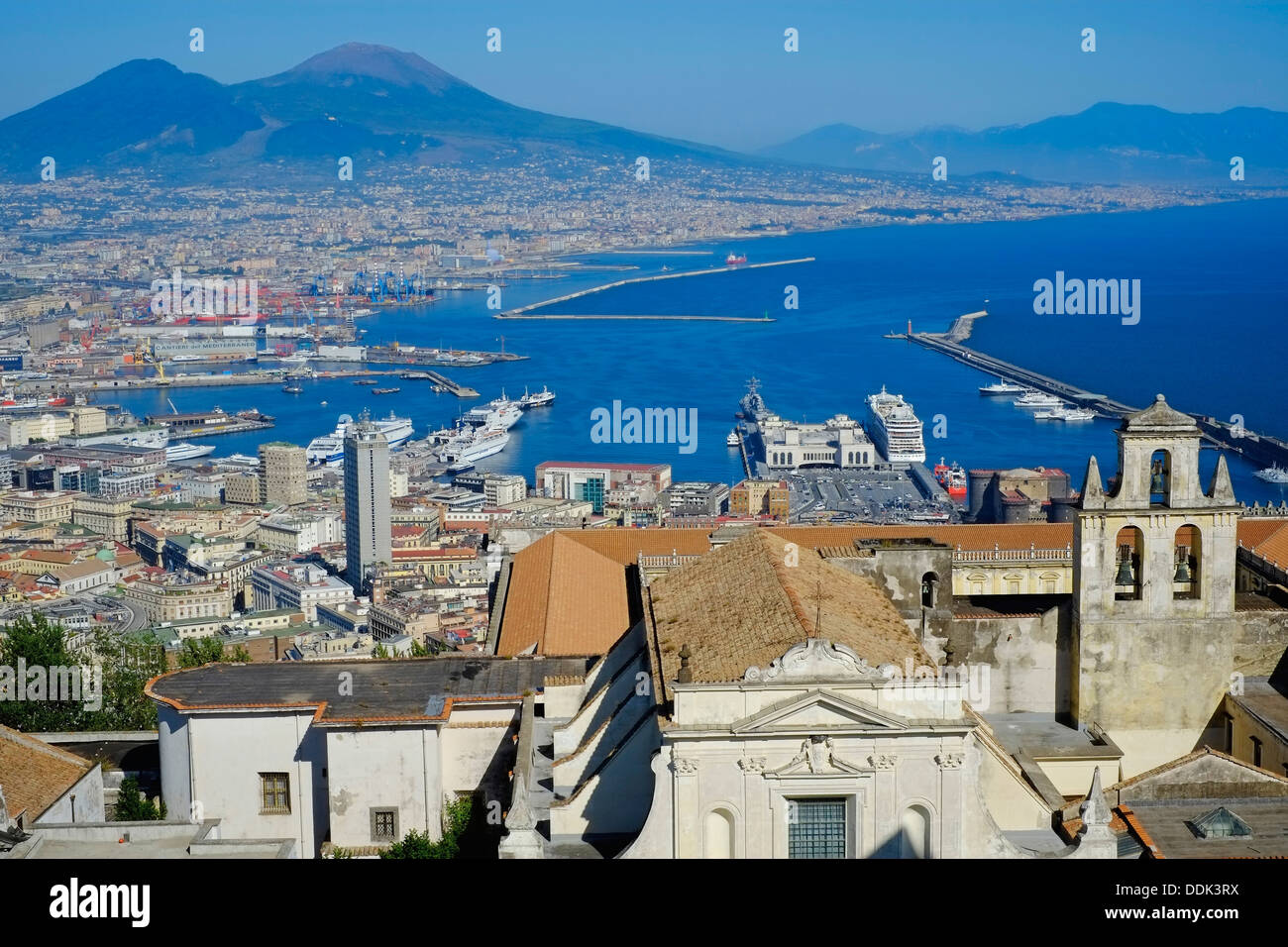 Italy, Campania, Naples, View from Castel Sant Elmo on Cortosa di San  Martino, harbour and Vesuvio Stock Photo - Alamy