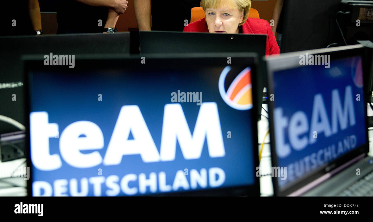 Berlin, Germany. 04th Sep, 2013. German Chancellor Angela Merkel visits her supporters in the German general election campaign of 'Team Deutschland' at the CDU headquarters in Berlin, Germany, 04 September 2013. Photo: KAY NIETFELD/dpa/Alamy Live News Stock Photo