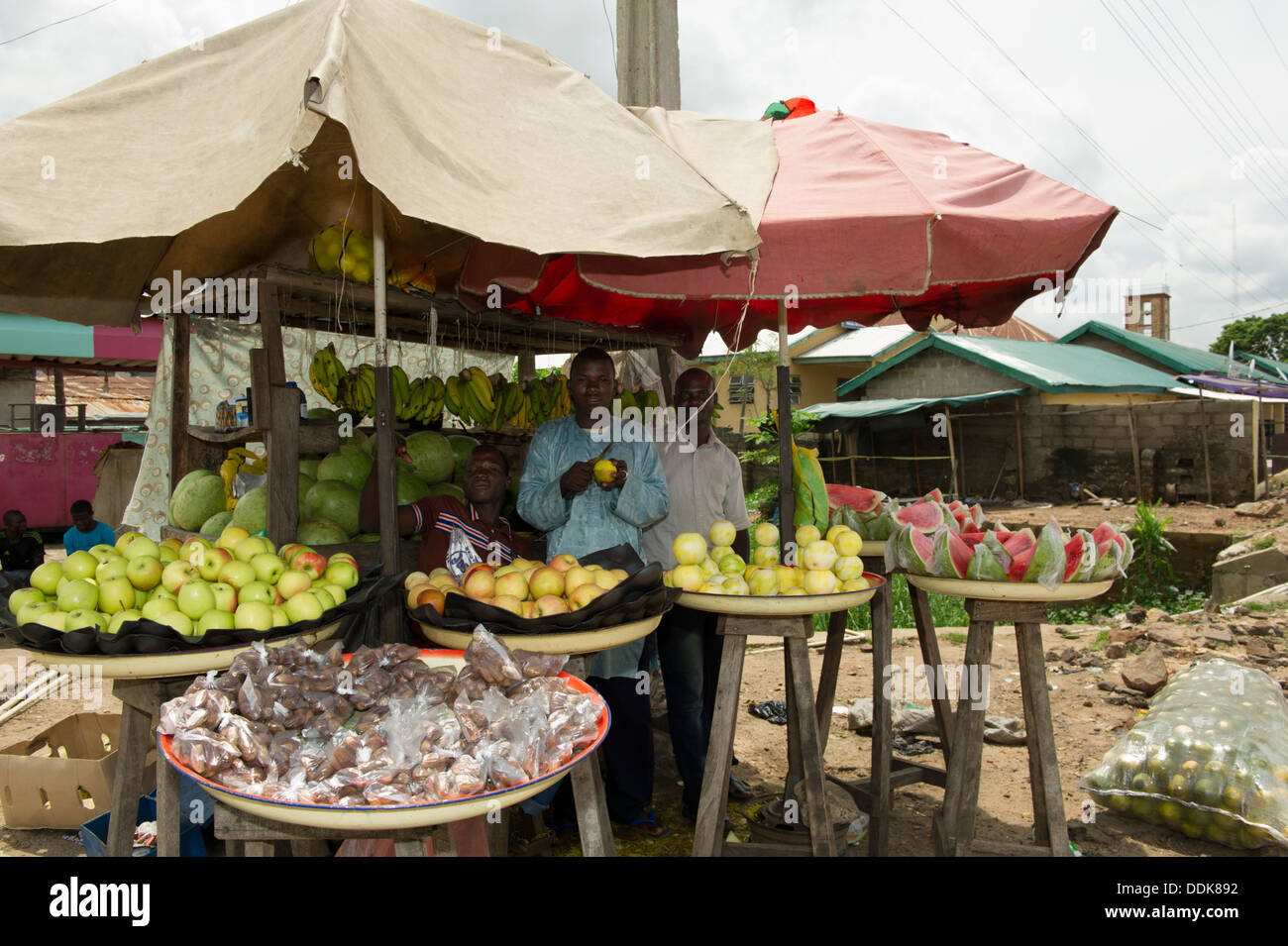 Two street vendors selling fruits in Lokoja, Nigeria Stock Photo