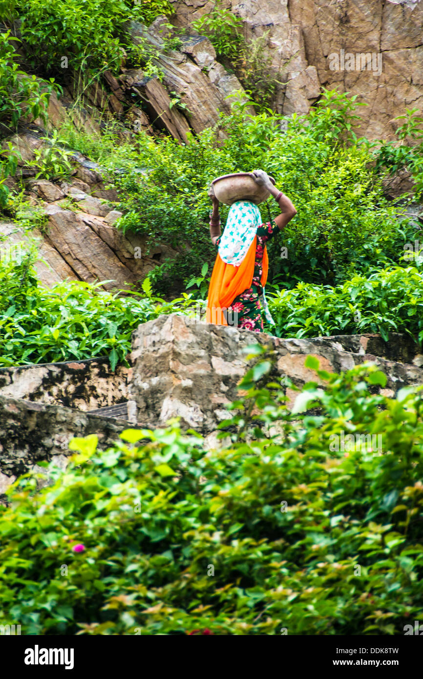 Indian woman carrying bowl Stock Photo Alamy