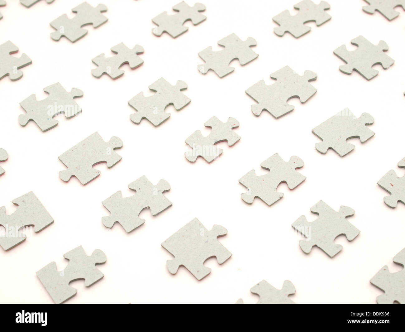 Puzzle pieces on a white background Stock Photo - Alamy