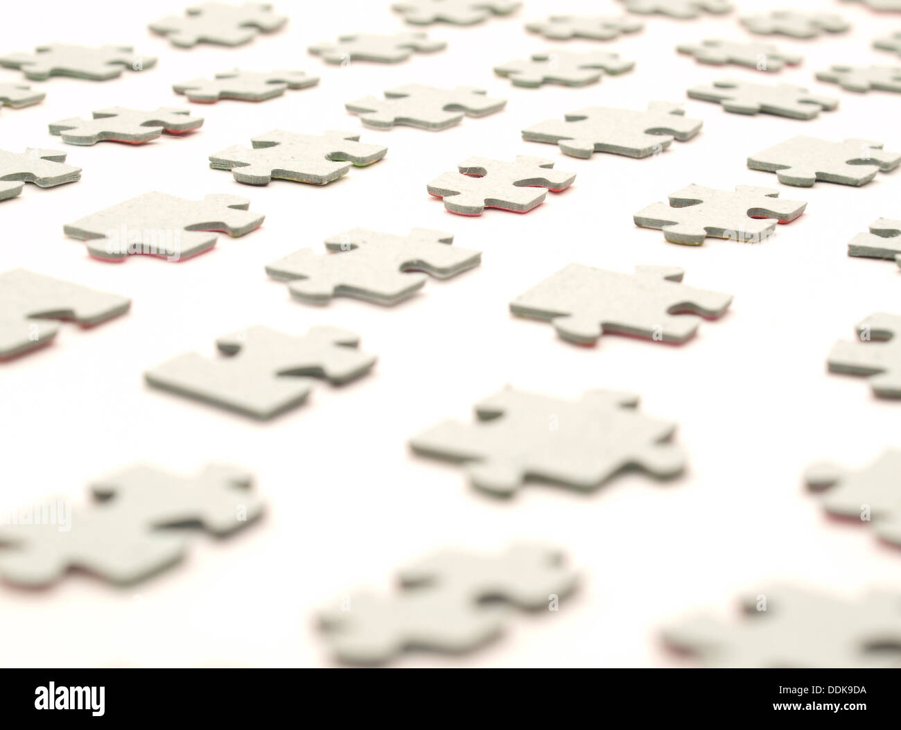 Puzzle pieces on a white background Stock Photo - Alamy