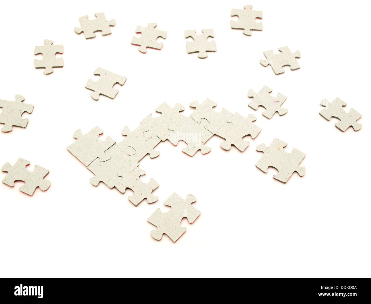 Puzzle on a white background Stock Photo - Alamy