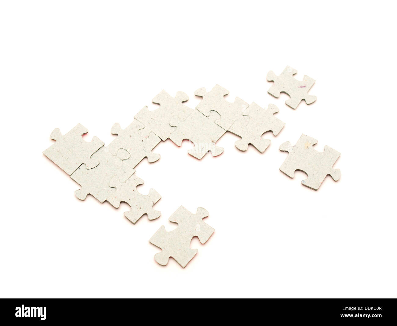Puzzle on a white background Stock Photo - Alamy