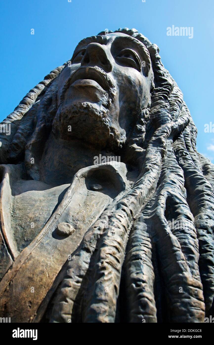 Bob Marley statue at night outside the National Stadium, Kingston