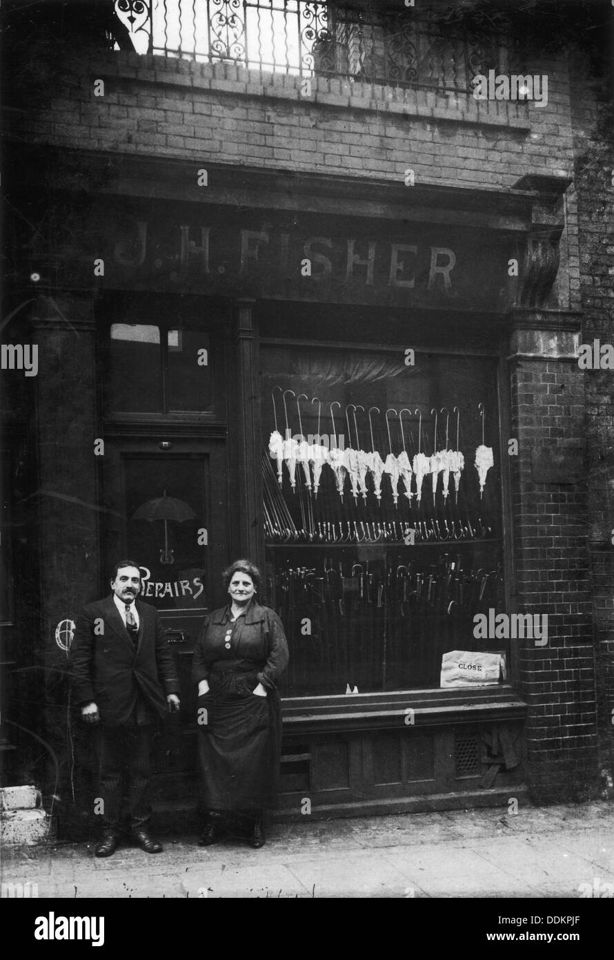 Polish Jews outside their umbrella shop in Hackney, London, c1910. Artist: Unknown Stock Photo