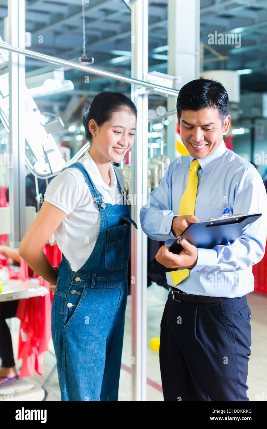 Factory labor sewing machines indonesia hires stock photography and