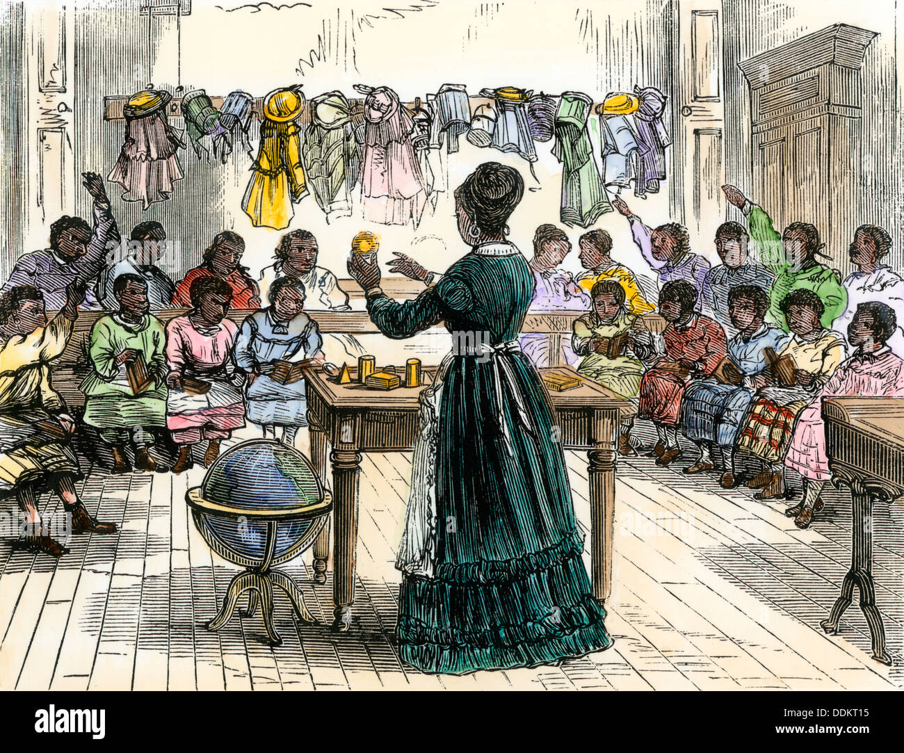 Teaching objects to children in a "colored school," New York City, 1870. Hand-colored woodcut Stock Photo