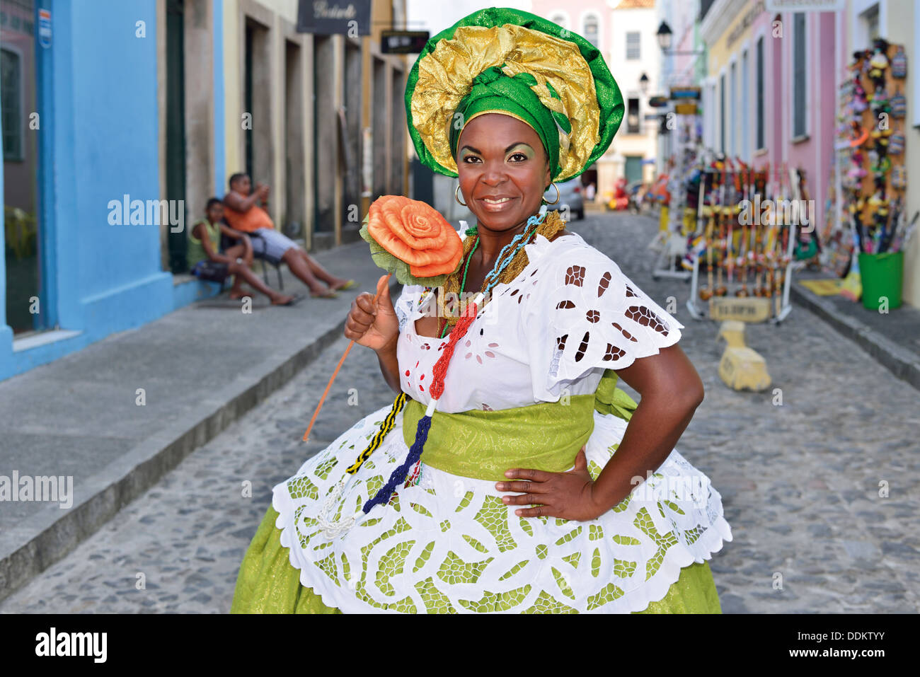 Brazil, Bahia: 'Baiana' Ana Cristina posing for a picture in the Rua Joao de Deus in the historic center of Salvador da Bahia Stock Photo