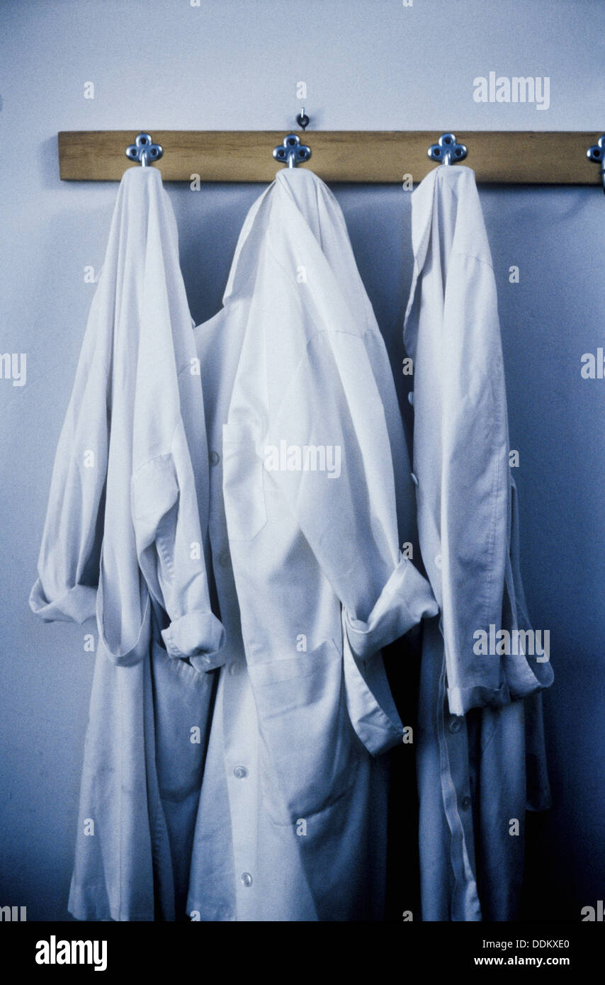 White lab coat hanging up hi-res stock photography and images - Alamy