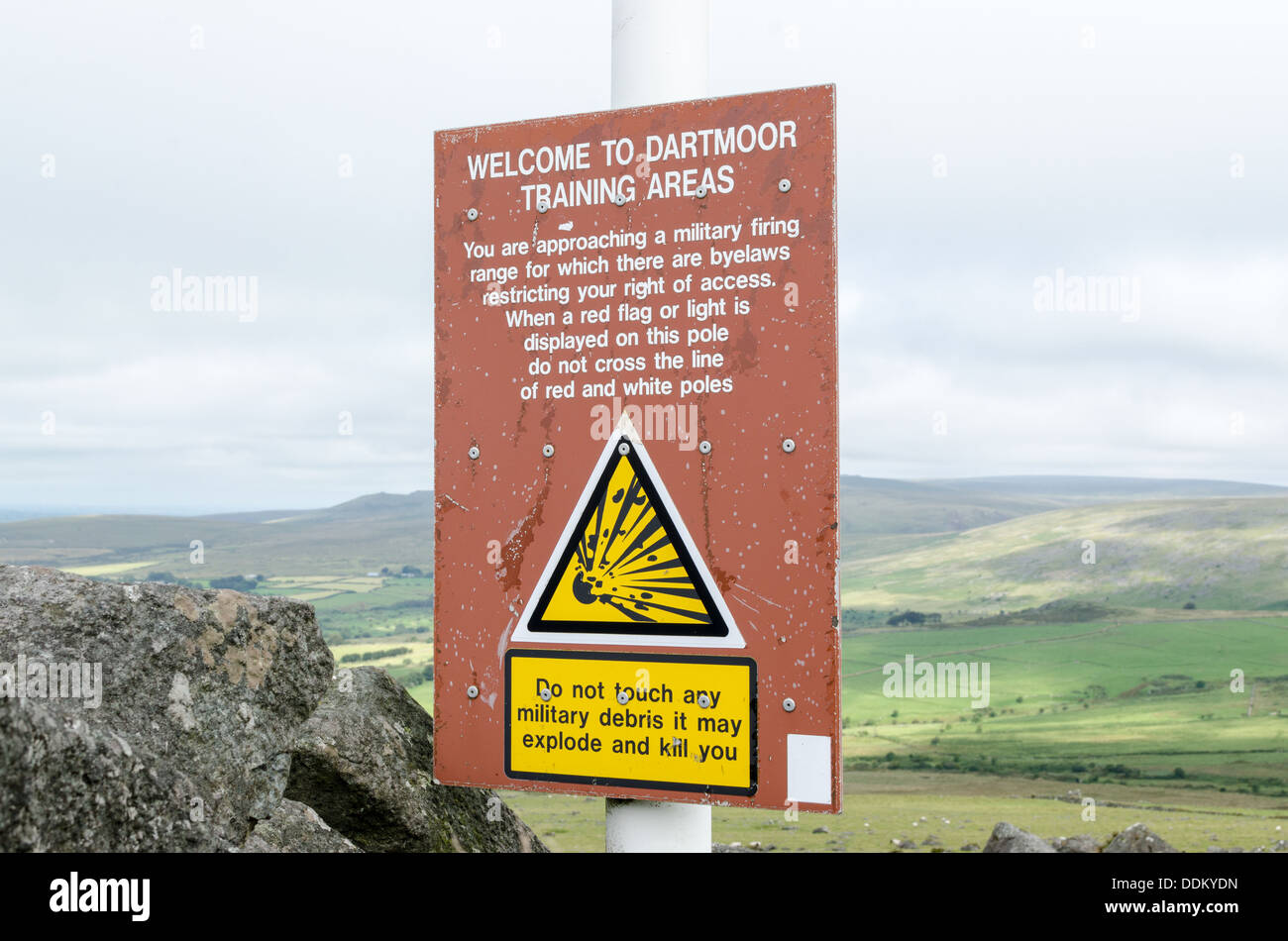 Ministry of Defence warning sign on White Tor by the Merrivale firing range on Dartmoor Stock Photo