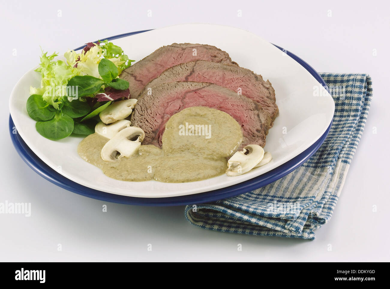 Roast beef with mushrooms Stock Photo Alamy